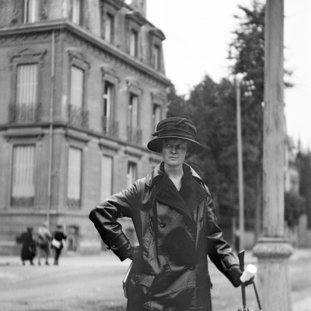 Helen Clay Frick in a raincoat and hat in Belgium, August 1920